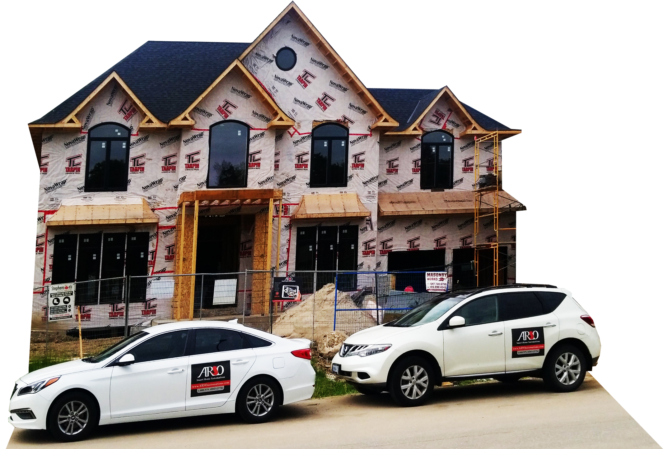 ARSO Electrical vehicles outside a custom home under construction